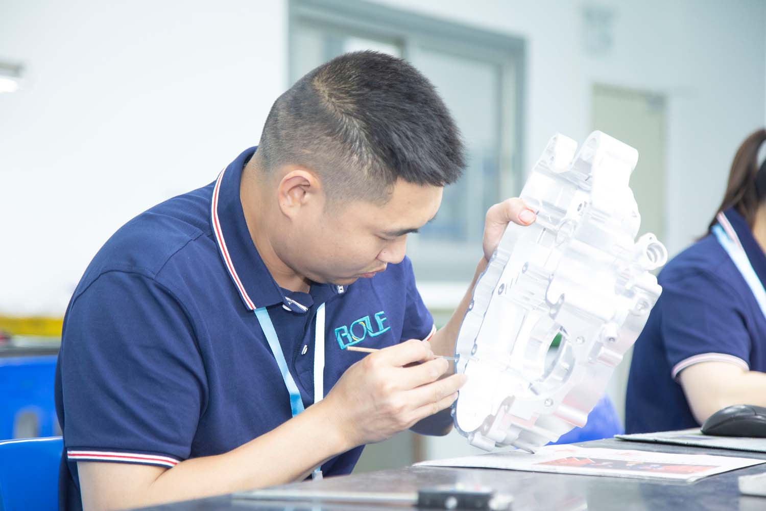 Manual deburring and surface finishing in Bole the machining parts manufacturer from China